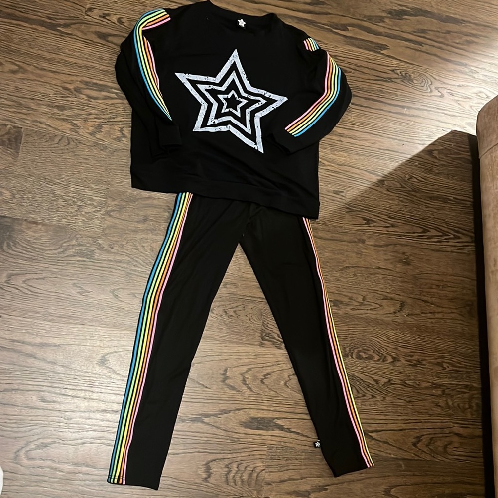 Soft two piece outfit. Size 11/12. Runs more like a 10. Worn once.